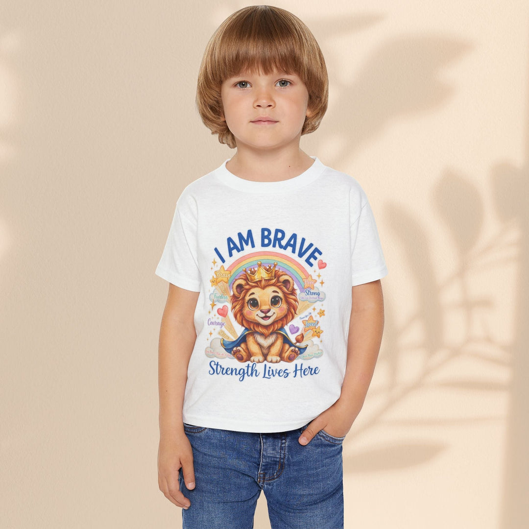 A child wearing a white Sea Dragon Dreams cotton t-shirt featuring a Leo Lion graphic with the text I Am Brave.