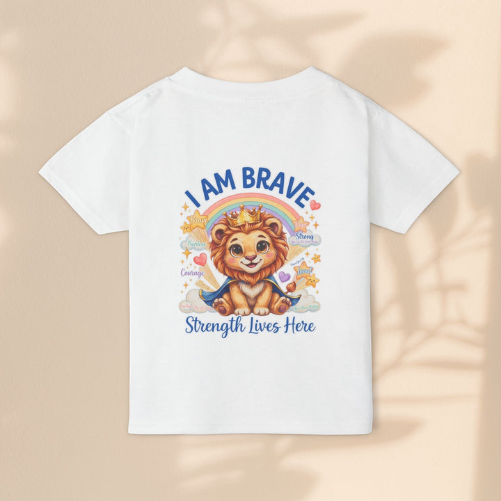 Sea Dragon Dreams toddler t-shirt featuring a cute Leo Lion character with a crown, rainbow, and I Am Brave text.