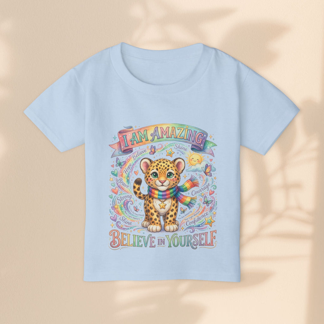 Sea Dragon Dreams light blue cotton toddler t-shirt with a cute leopard, rainbow scarf, and empowering affirmations.