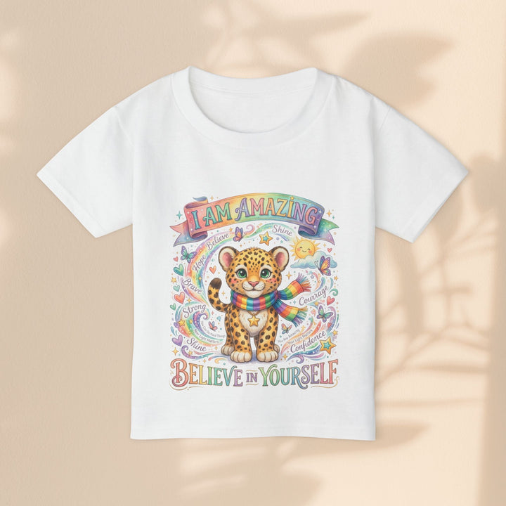 Sea Dragon Dreams white cotton toddler t-shirt featuring a cute leopard with a rainbow scarf and uplifting affirmations.