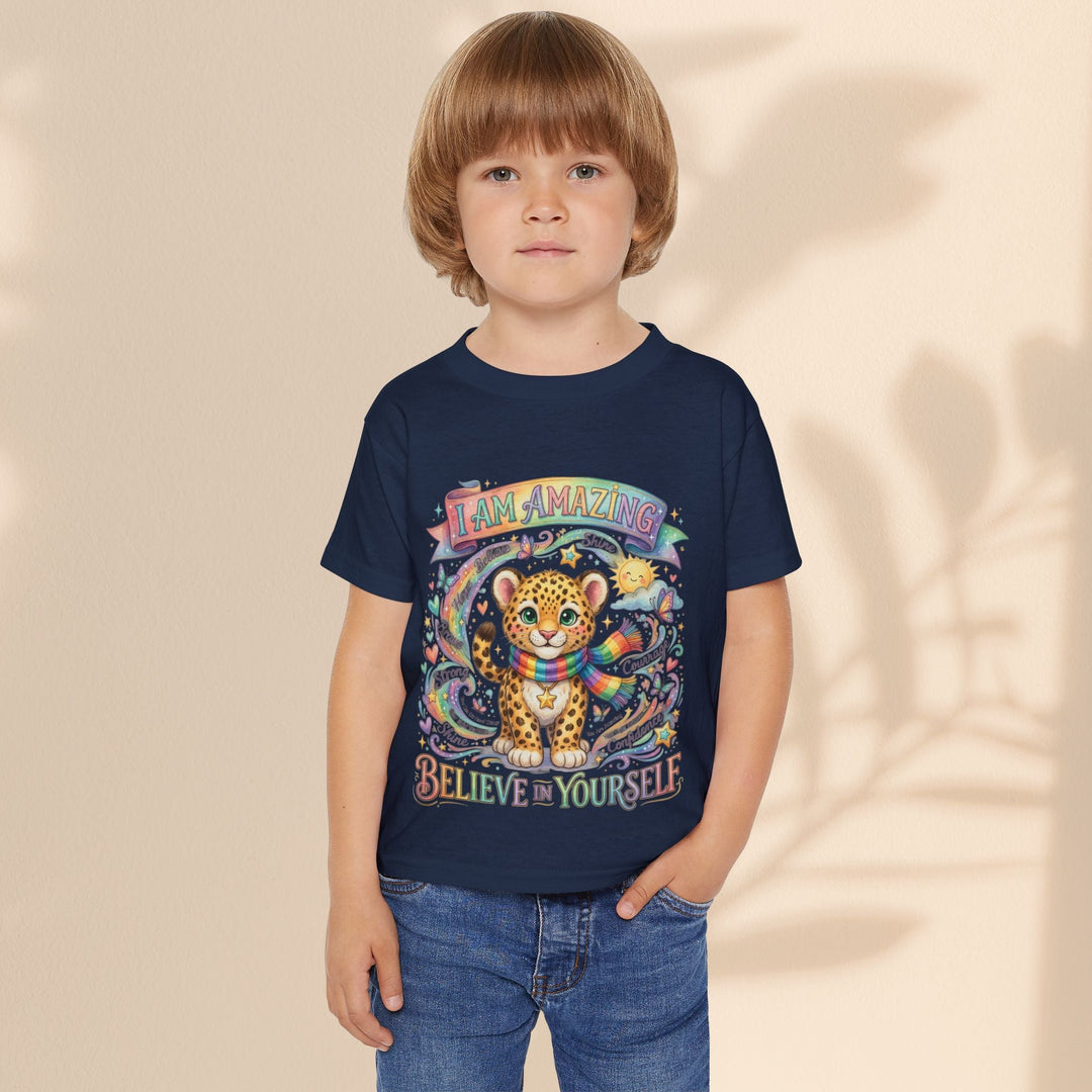 Sea Dragon Dreams toddler t-shirt in navy blue cotton featuring a cute leopard, rainbow, and I Am Amazing graphic.