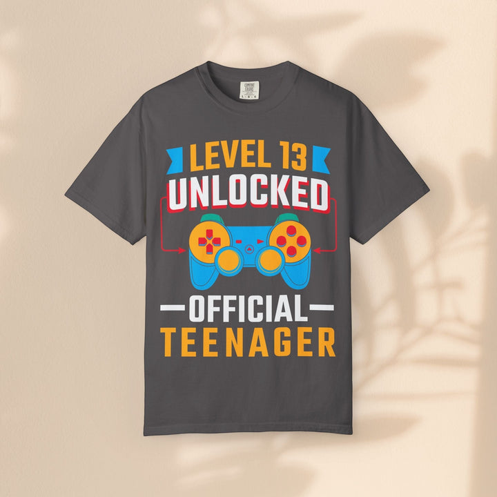 Sea Dragon Dreams Level 13 Unlocked gamer t-shirt in charcoal grey cotton with a retro gaming controller graphic.