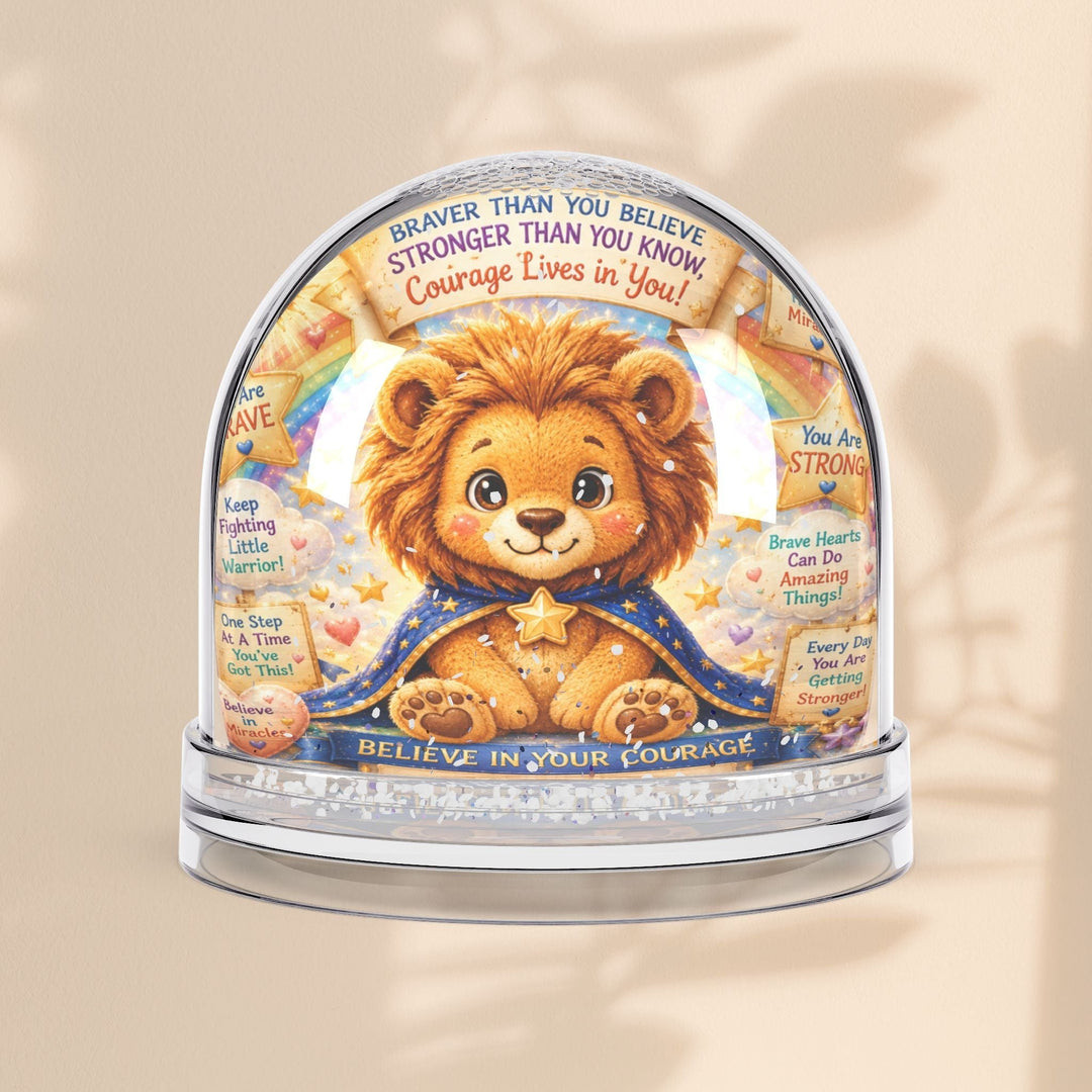 Sea Dragon Dreams Brave Buddies lion snow globe with inspirational text and glitter, featuring a cute lion character.