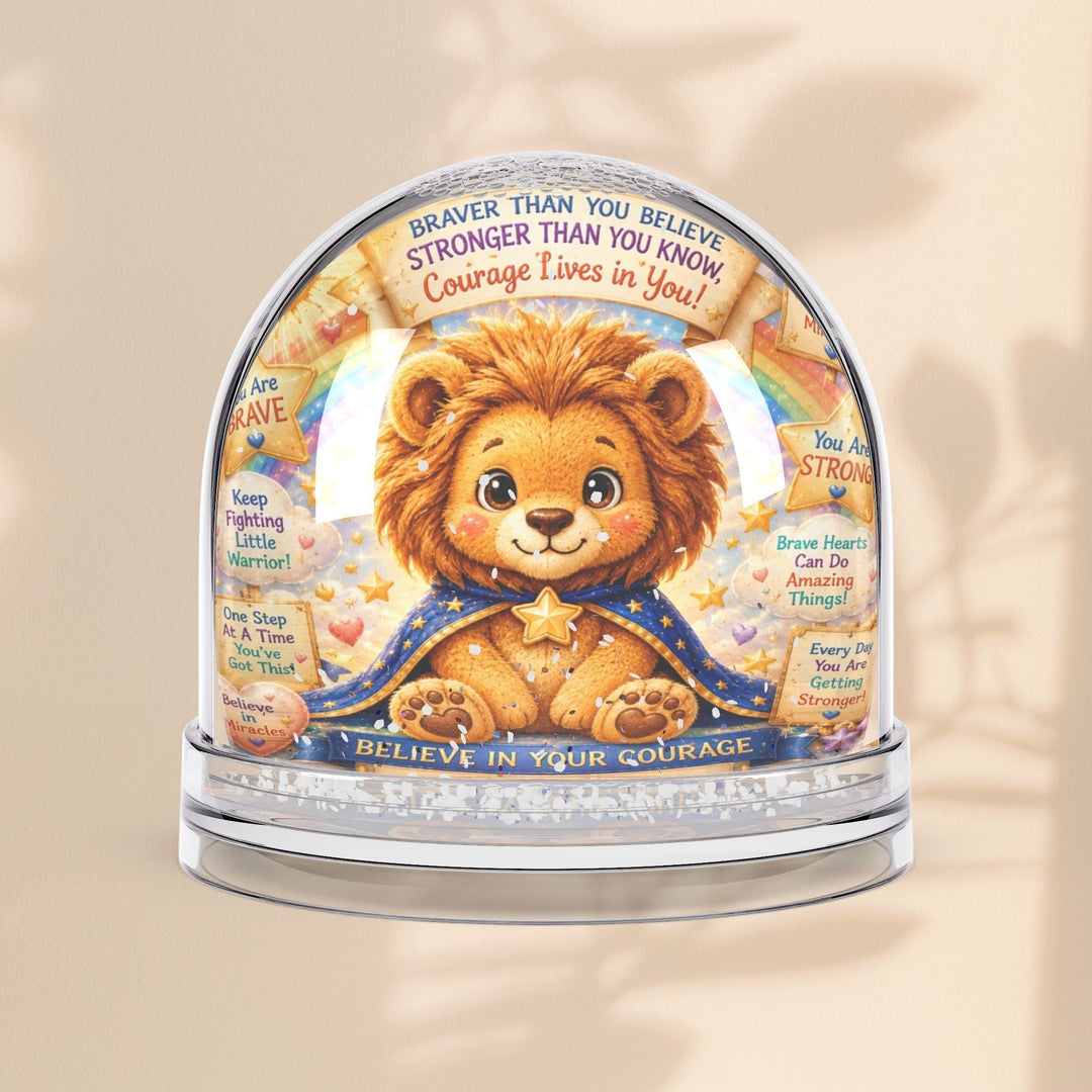 Sea Dragon Dreams Leo Lion snow globe with inspirational quotes and glitter, featuring a brave lion in a blue cape.