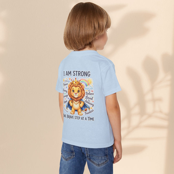 Sea Dragon Dreams toddler t-shirt in light blue cotton featuring a lion graphic with the text I Am Strong