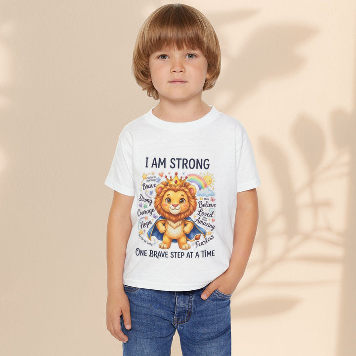 Sea Dragon Dreams toddler t-shirt featuring a cute lion graphic with the empowering text I Am Strong