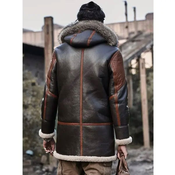 Sea Dragon Dreams men's longline bomber jacket in dark brown leather with a fur-lined hood and shearling trim