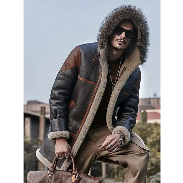 Sea Dragon Dreams men's longline leather bomber jacket with a warm shearling hood and interior in dark brown tones.