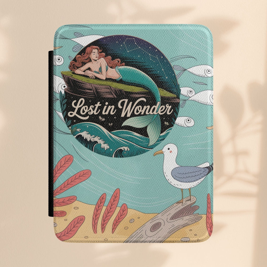 Sea Dragon Dreams Lost in Wonder Kindle case with a mermaid illustration on a light blue background