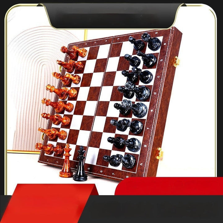 Sea Dragon Dreams portable magnetic chess set with brown and black pieces on a folding wooden board for travel