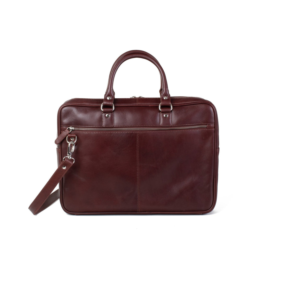 Sea Dragon Dreams mahogany leather laptop bag with slim silhouette, top handles, and detachable shoulder strap.