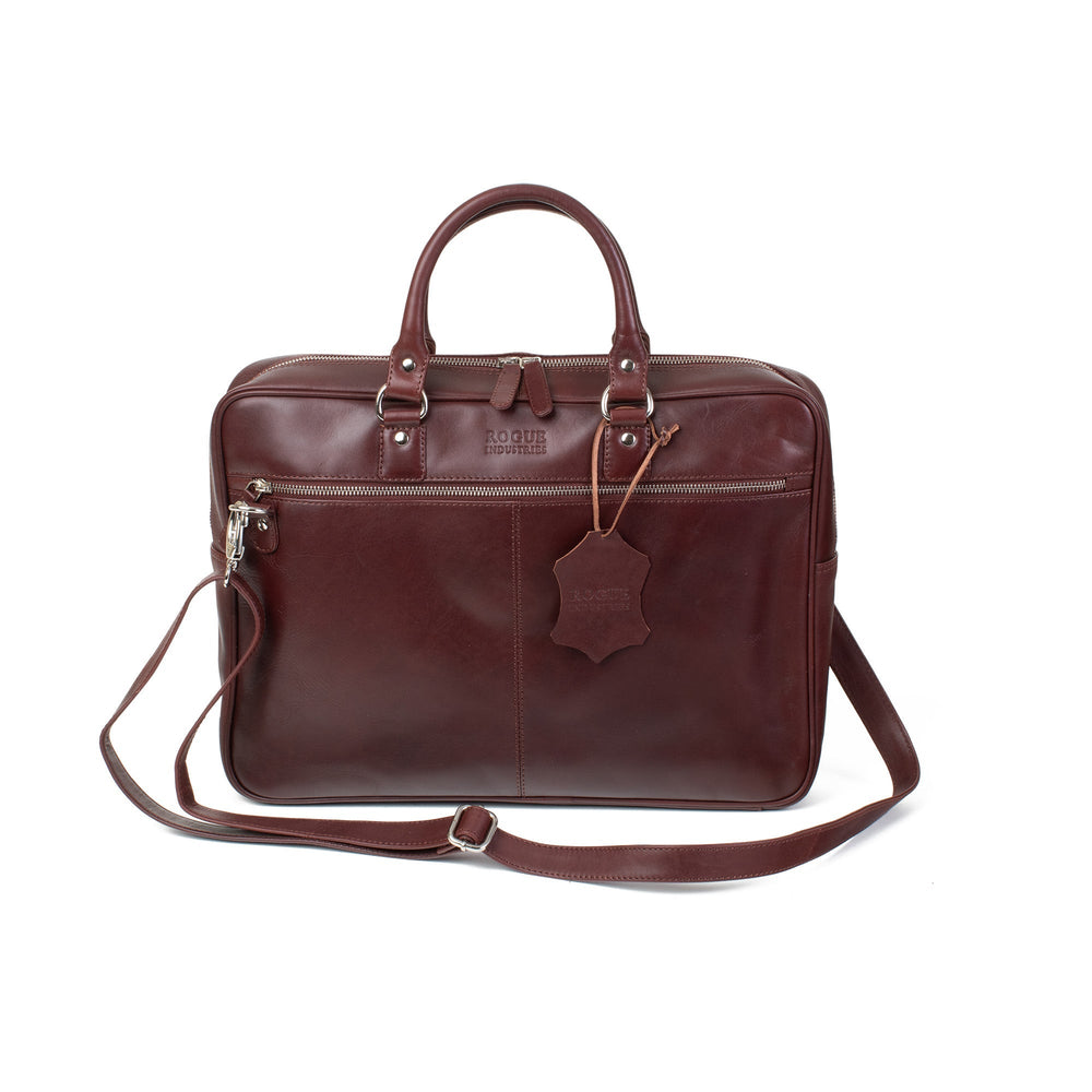 Sea Dragon Dreams mahogany leather laptop bag with slim silhouette, nickel hardware, and removable shoulder strap.