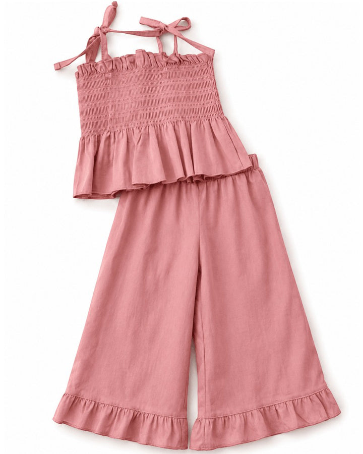 Sea Dragon Dreams Maisie smocked two-piece set in pressed peony pink with ruffled hem and tie-strap top.