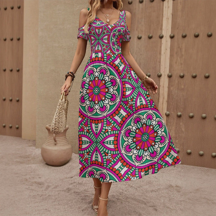 Sea Dragon Dreams off-shoulder maxi dress featuring a vibrant pink, green, and white mandala pattern in soft polyester