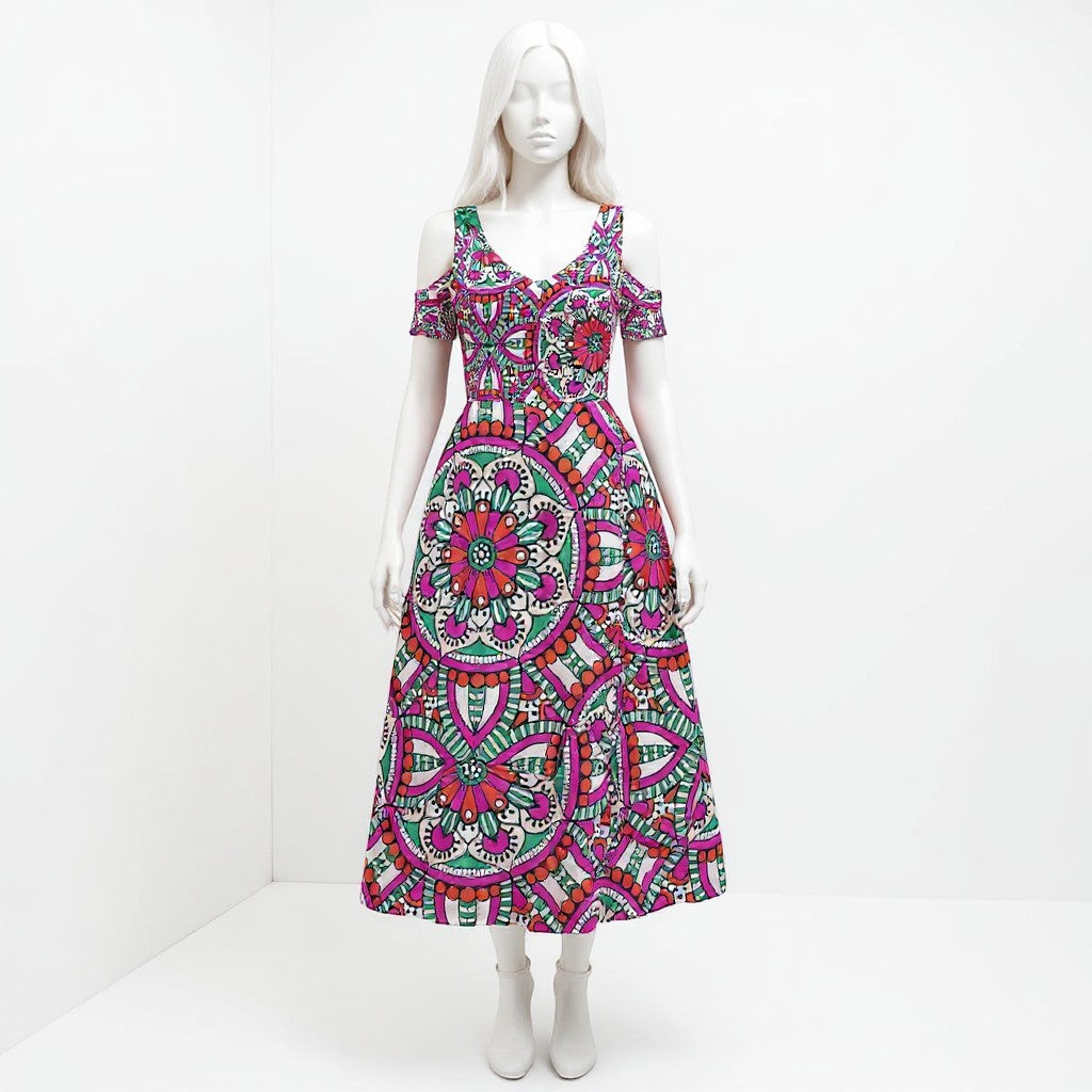 Sea Dragon Dreams off-shoulder maxi dress with a vibrant pink and green circular mandala pattern on a white mannequin