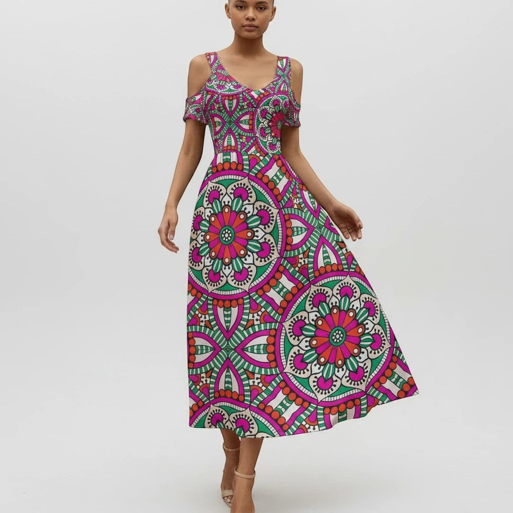 Sea Dragon Dreams off-shoulder maxi dress featuring a vibrant pink, green, and white circular mandala pattern.