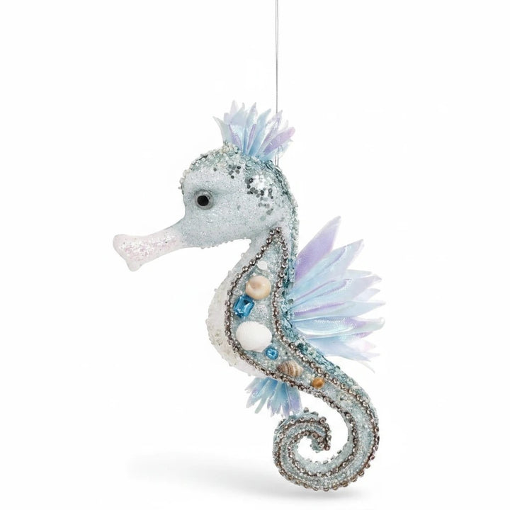 Sea Dragon Dreams Mark Roberts blue seahorse ornament with glitter, sequins, beads, gems, and iridescent fabric fins.