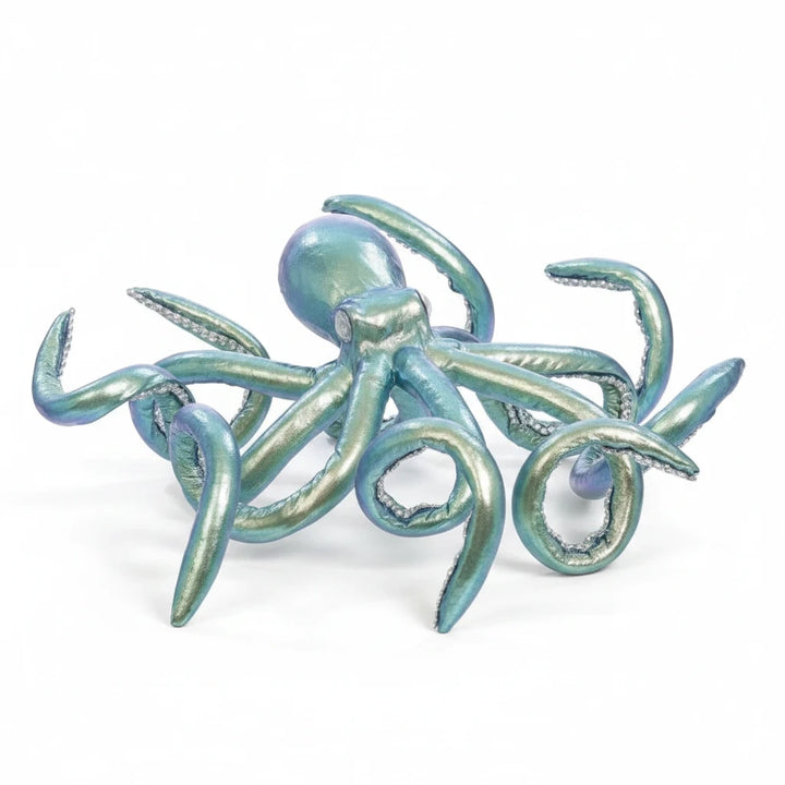 Sea Dragon Dreams Mark Roberts 11.5-inch turquoise octopus figurine with shimmering fabric and detailed tentacles.