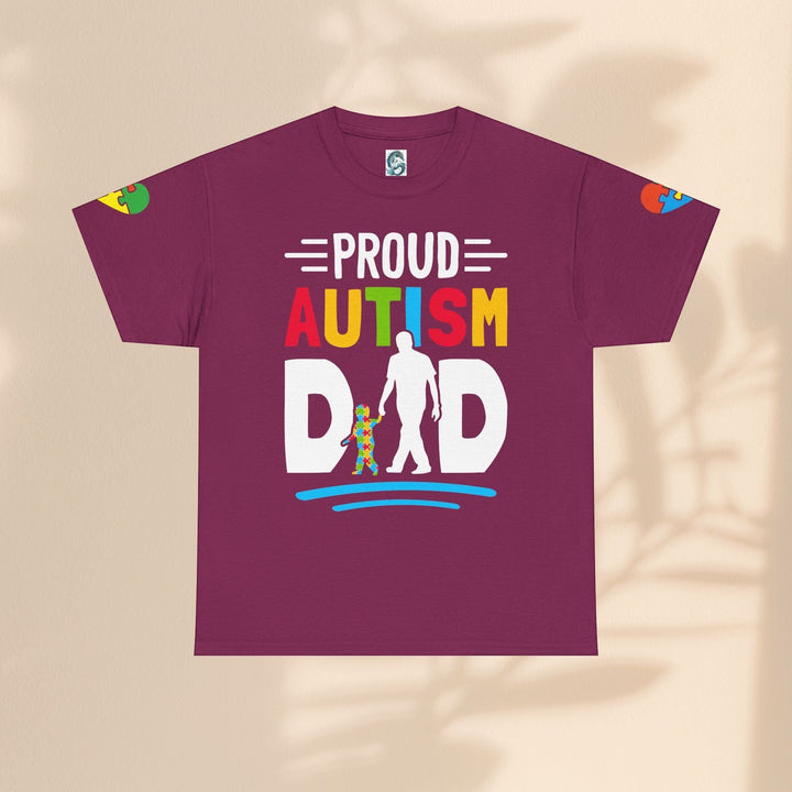 Sea Dragon Dreams maroon heavy cotton t-shirt with Proud Autism Dad graphic and colorful puzzle piece accents.