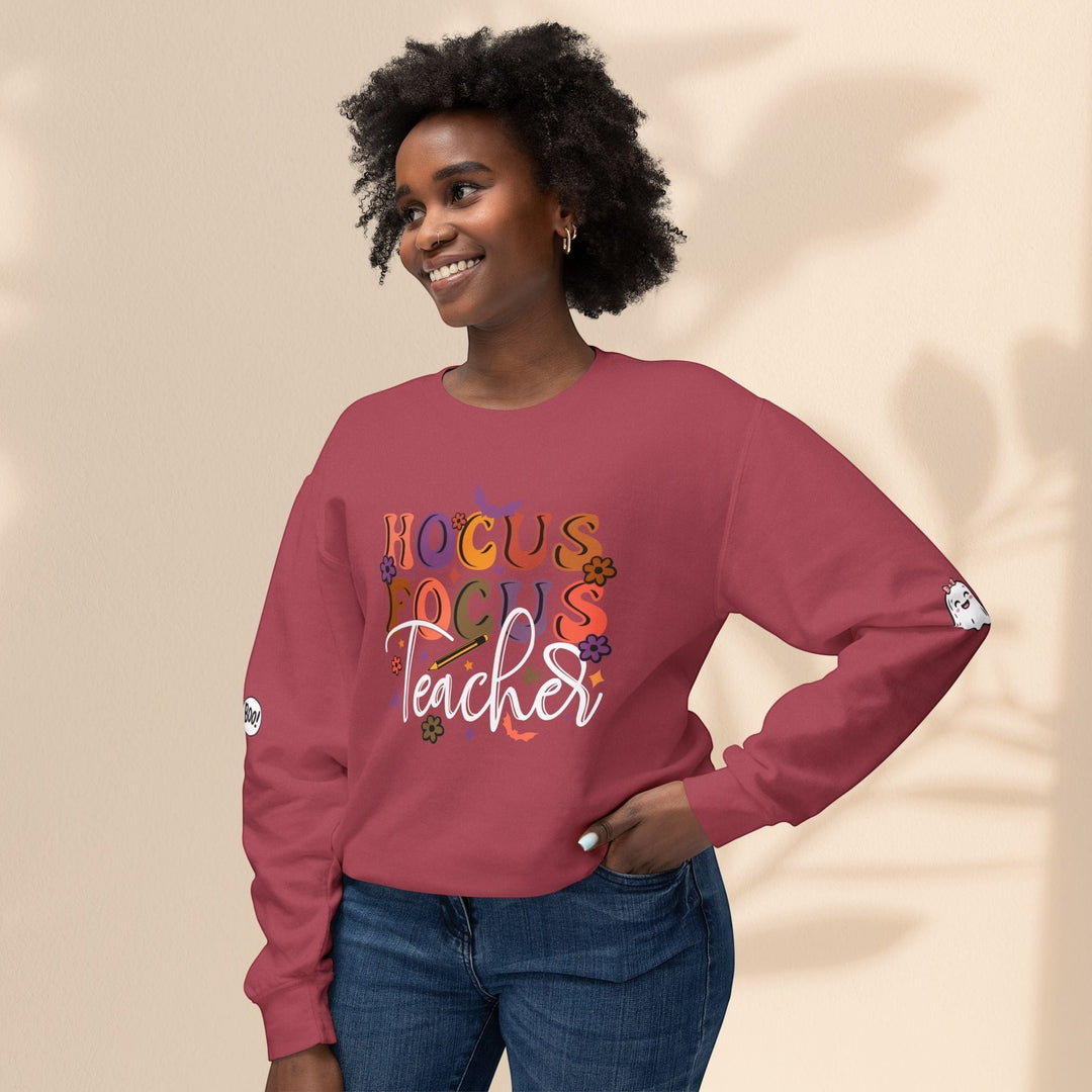 Sea Dragon Dreams unisex crewneck sweatshirt in maroon with Hocus Focus Teacher graphic and sleeve details