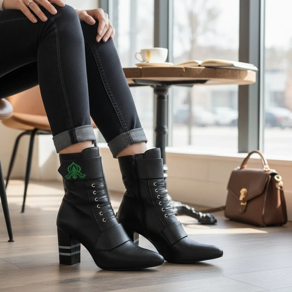 Sea Dragon Dreams Michaela V Marta black leather knee-high boots with lace-up detail and block heel worn with jeans