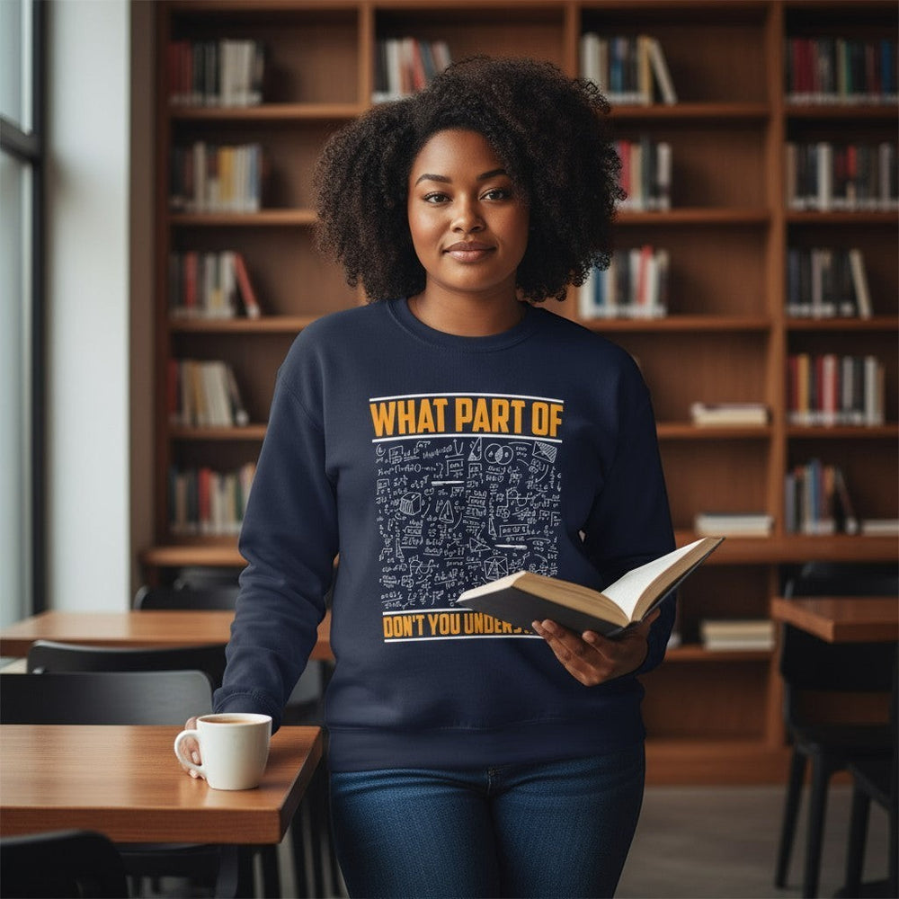 Sea Dragon Dreams navy blue crewneck sweatshirt with math equations, worn by a woman holding a book in a library.