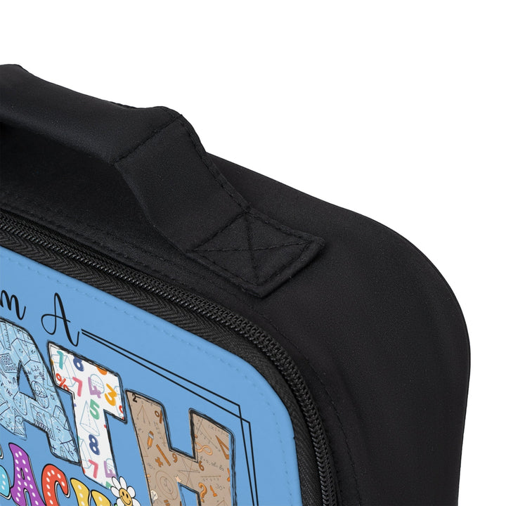 Sea Dragon Dreams math teacher lunch bag with black handle and blue patterned polyester design