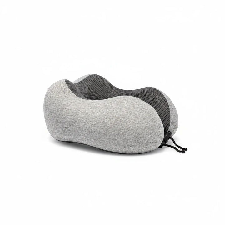 Sea Dragon Dreams ergonomic grey memory foam travel pillow with a contoured shape for neck support and adjustable cord.