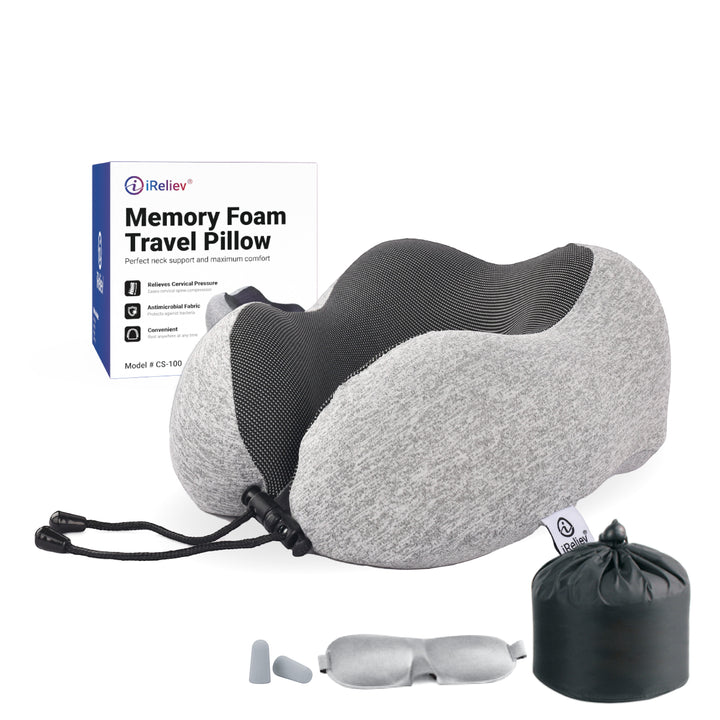 Sea Dragon Dreams memory foam travel pillow with ergonomic neck support, grey fabric, carrying bag, and sleep accessories.