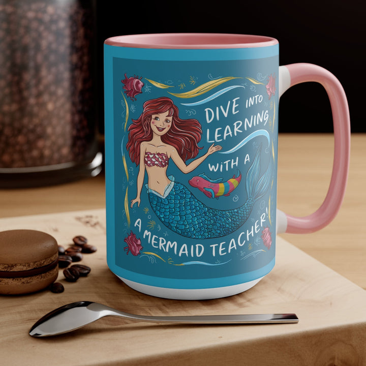 Sea Dragon Dreams ceramic accent mug with pink handle and mermaid teacher illustration for lifelong learners