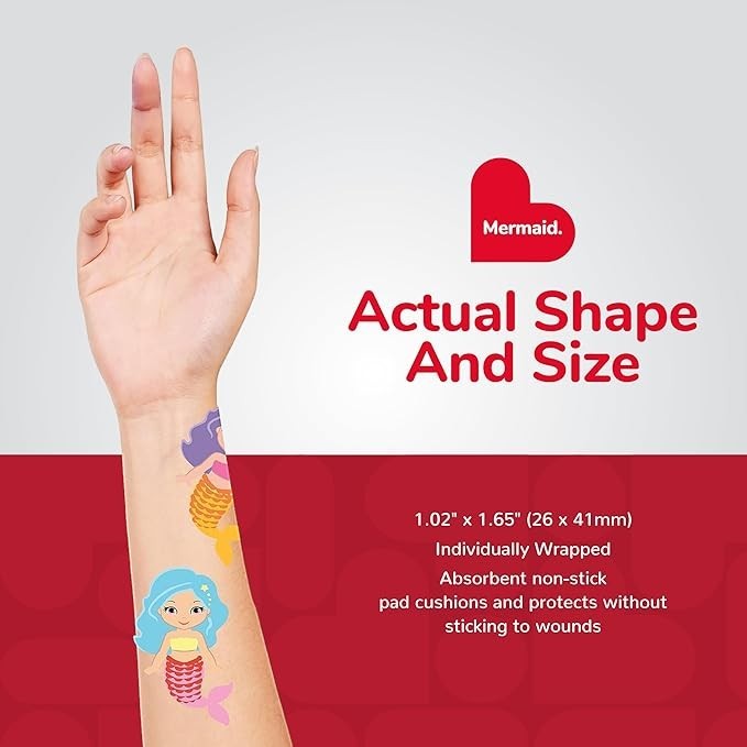 Sea Dragon Dreams BioSwiss mermaid-shaped bandages shown on a wrist to demonstrate actual size and colorful design.
