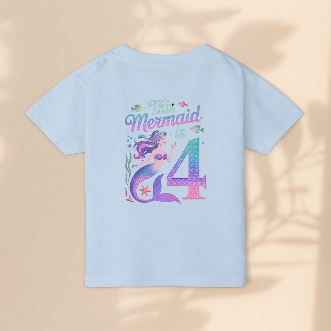 Sea Dragon Dreams light blue toddler t-shirt featuring a colorful mermaid graphic and the text This Mermaid Is 4