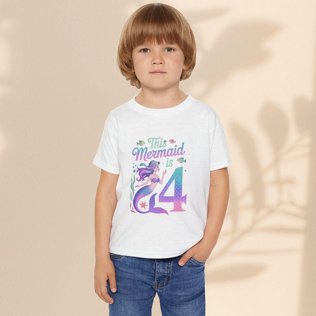 Sea Dragon Dreams toddler wearing a white cotton t-shirt with a This Mermaid Is 4 birthday graphic design