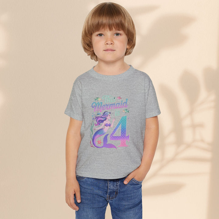 Sea Dragon Dreams toddler t-shirt in sport grey with This Mermaid Is 4 birthday graphic on a young child