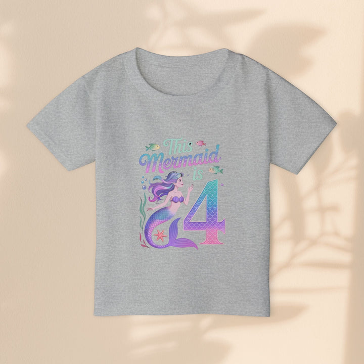 Sea Dragon Dreams grey toddler t-shirt with a mermaid graphic and This Mermaid Is 4 text for a fourth birthday.