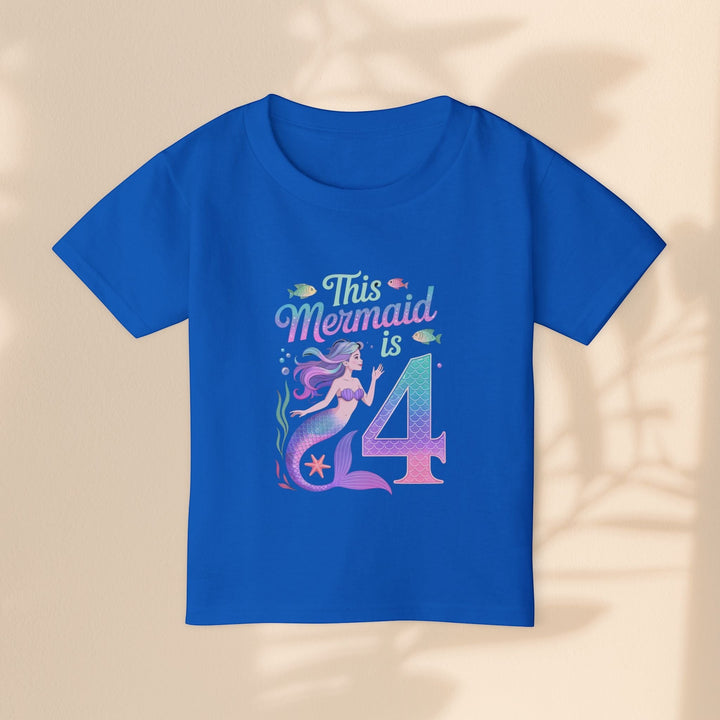 Sea Dragon Dreams blue toddler t-shirt with This Mermaid Is 4 graphic for a fourth birthday celebration.