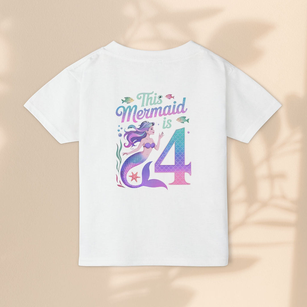 Sea Dragon Dreams white cotton toddler t-shirt with This Mermaid Is 4 birthday graphic and colorful mermaid design.
