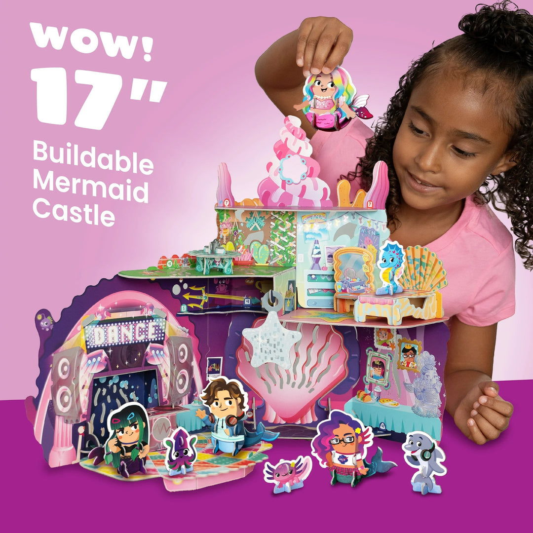 Child playing with Sea Dragon Dreams 17-inch buildable mermaid castle playset featuring figures and dance floor