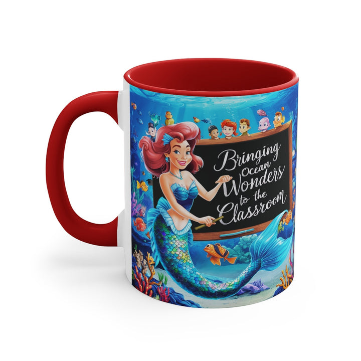 Sea Dragon Dreams ceramic mug with a red handle and interior featuring a mermaid teacher and ocean classroom design.