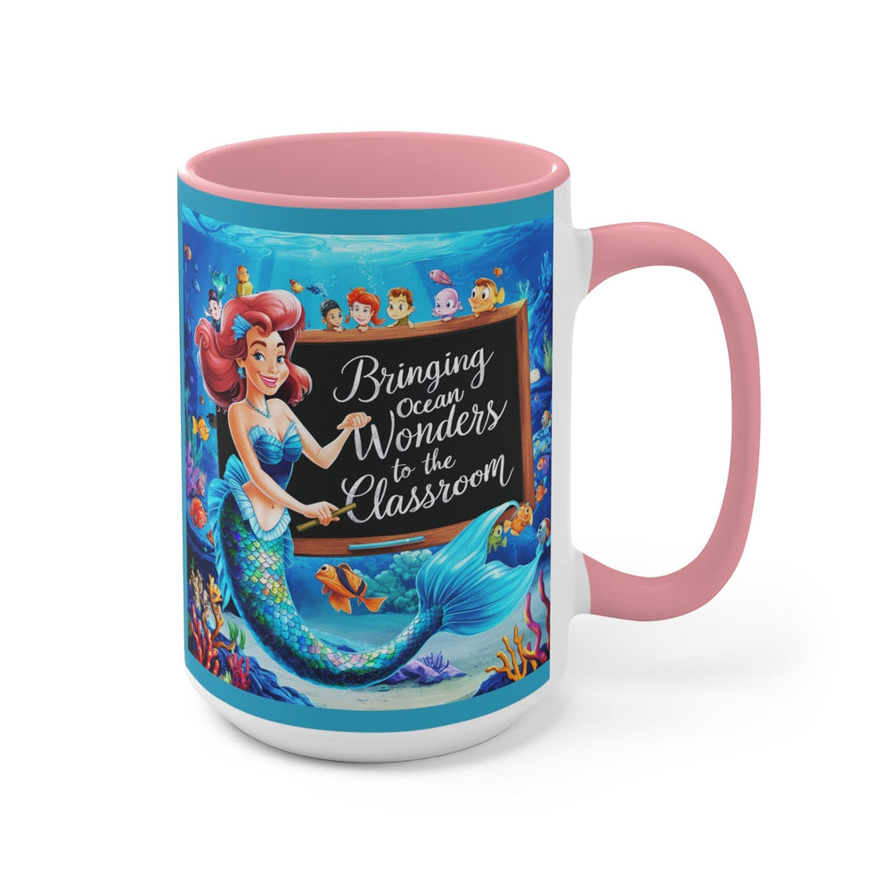 Sea Dragon Dreams ceramic accent mug with pink handle and interior featuring a mermaid teacher and ocean classroom