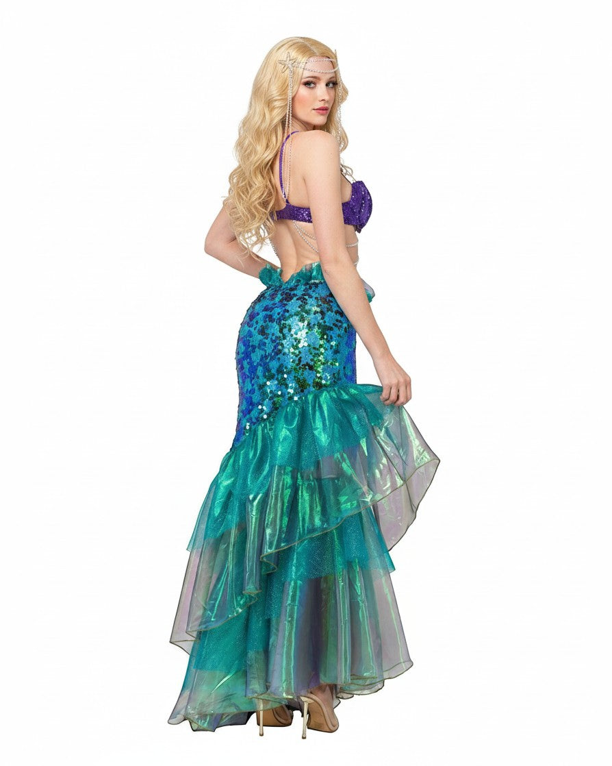 Sea Dragon Dreams mermaid costume with purple sequin shell bra and shimmering green-blue fishtail skirt on a model.