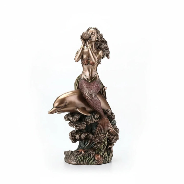 Sea Dragon Dreams polystone mermaid riding a dolphin figurine with a seashell, featuring a detailed cresting wave base.
