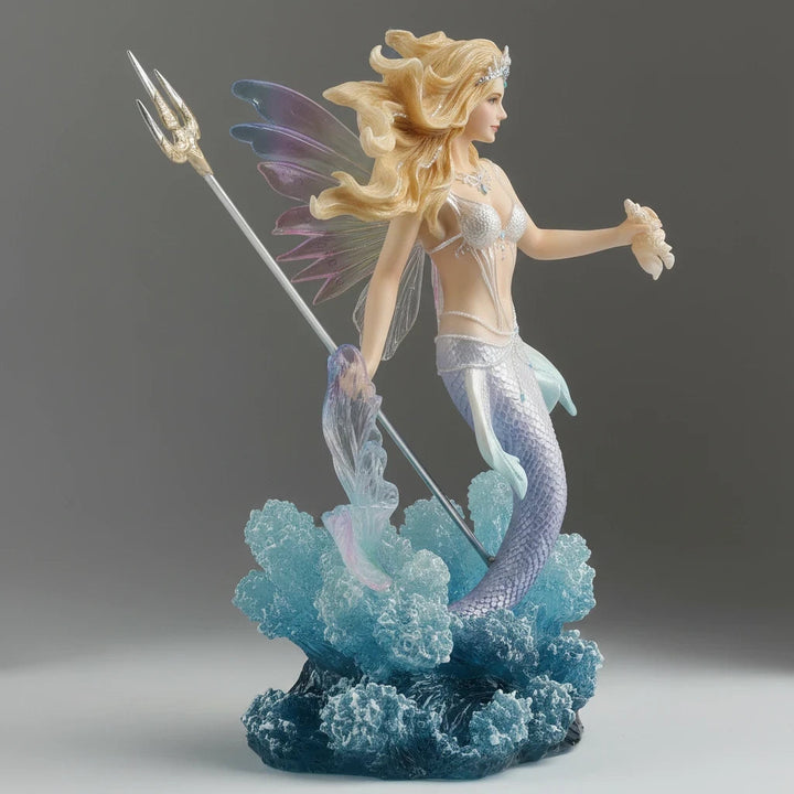 Sea Dragon Dreams Queen Mermaid Fairy figurine in color finish, holding a trident and seashell amidst sculpted seafoam