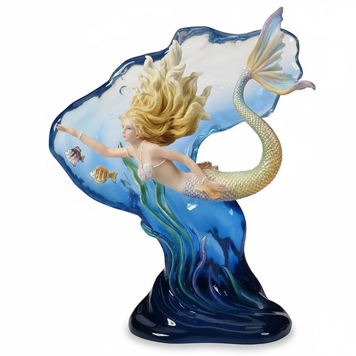 Sea Dragon Dreams Heart of the Ocean polystone mermaid figurine with blond hair, gold tail, and translucent backdrop.