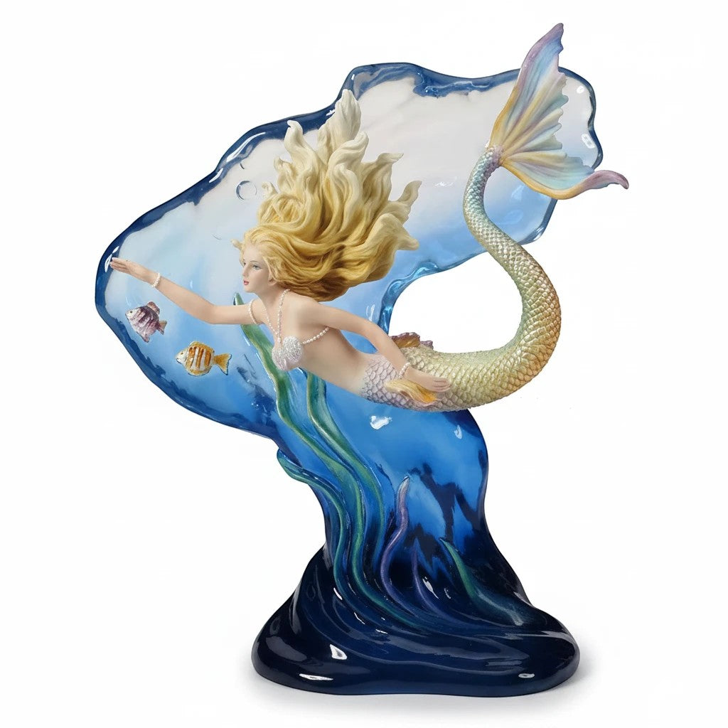 Sea Dragon Dreams Heart of the Ocean polystone mermaid figurine with a gold-tinged tail and translucent water backdrop