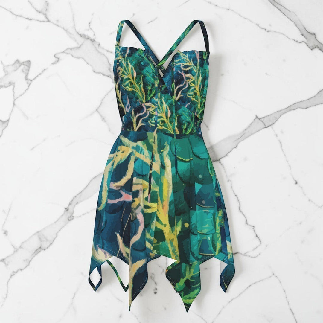 Sea Dragon Dreams mermaid green sleeveless slip dress with a vibrant underwater coral reef print and handkerchief hem.
