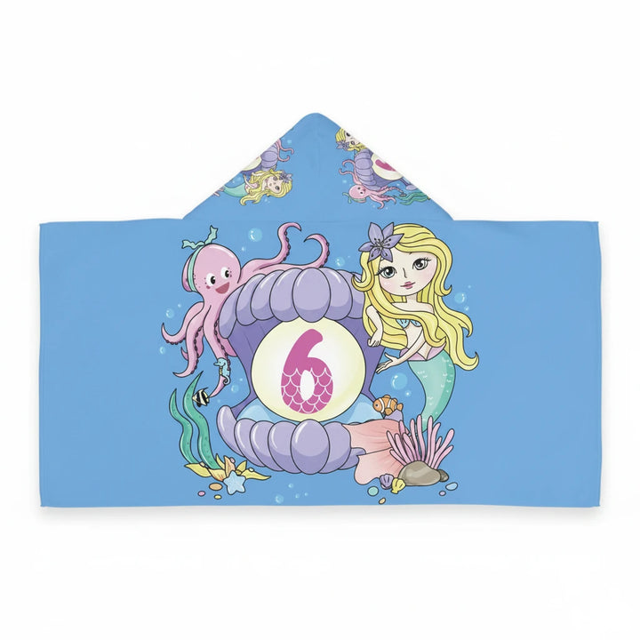 Sea Dragon Dreams kids hooded towel with mermaid, octopus, and number 6 in a seashell on a blue background