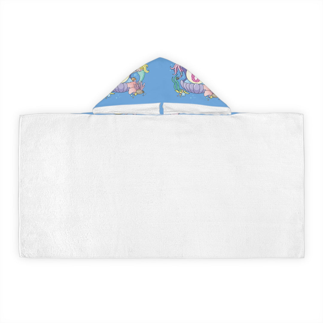 Sea Dragon Dreams kids hooded towel with a blue mermaid and seashell print on the hood and white cotton terry body.