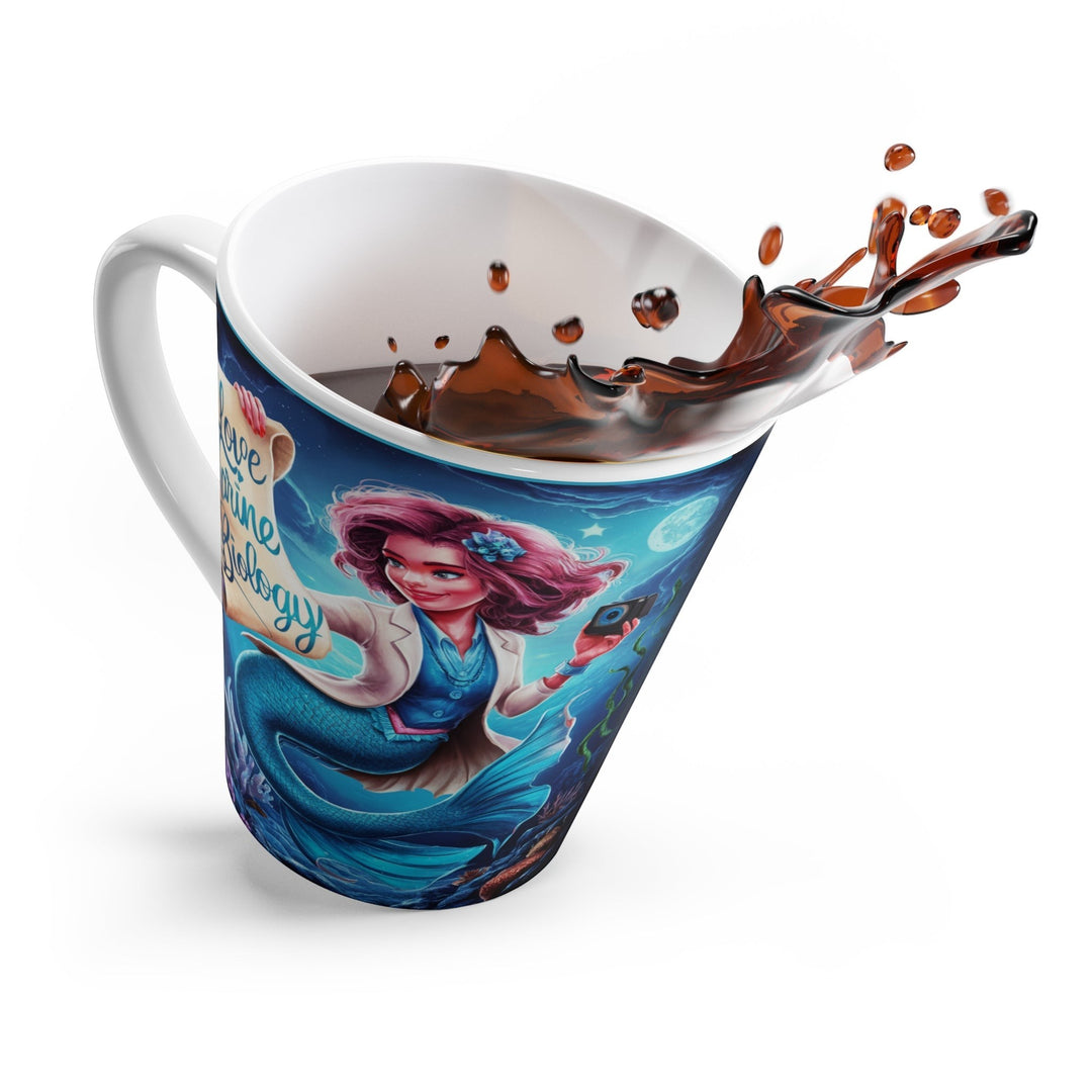 Sea Dragon Dreams white ceramic latte mug featuring a mermaid marine biologist illustration and splashing coffee