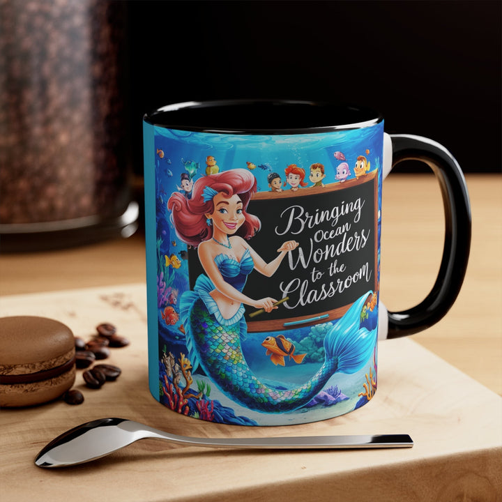 Sea Dragon Dreams ceramic mug featuring a mermaid teacher in an underwater classroom with vibrant ocean life graphics.